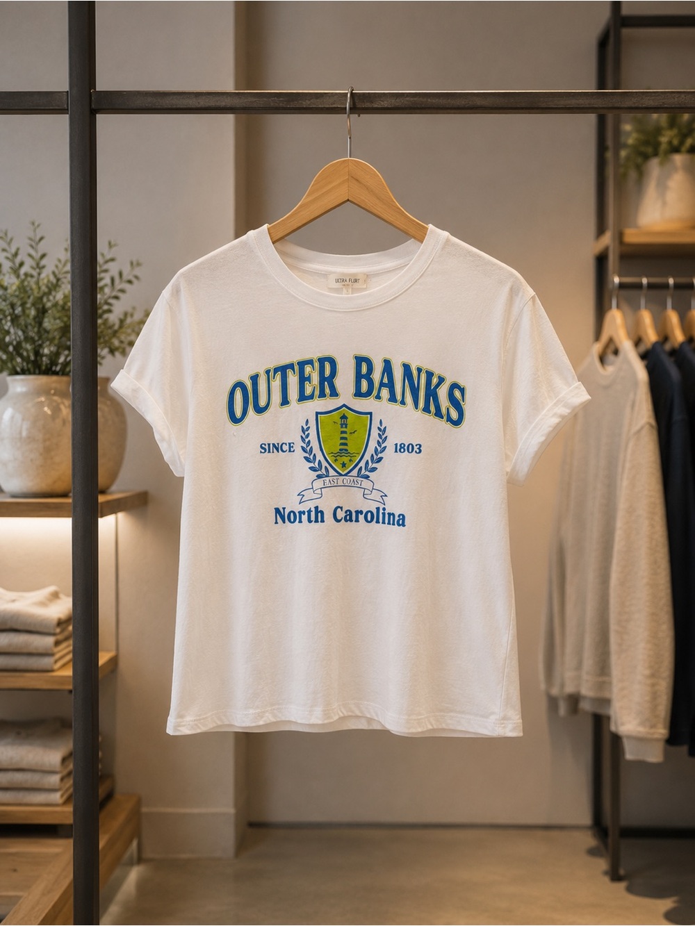Ultra Flirt White Tee with Blue and Yellow Crest Graphic